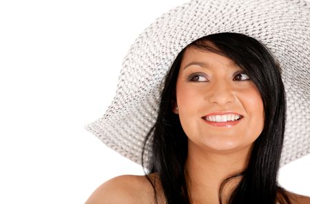 Woman wearing a summer hat and smiling - isolated