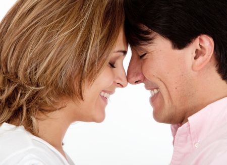 beautiful-loving-couple-heads-together-isolated-71600953 Beautiful loving couple with heads together - isolated over white