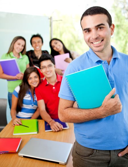 Group of students at the university with notebooks