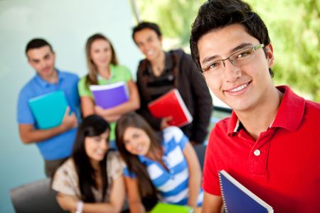 Group of students at the university with notebooks