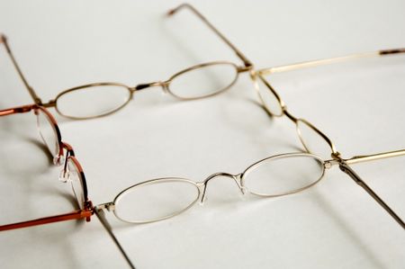 Four pairs of reading glasses