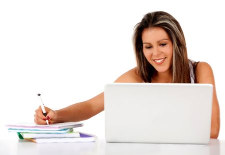 Happy female student with a laptop and notebooks - isolated