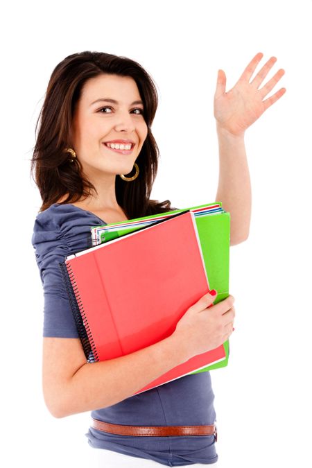 Female student waving with notebooks - isolated over white