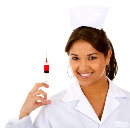 Nurse holding a syringe and smiling - isolated over white