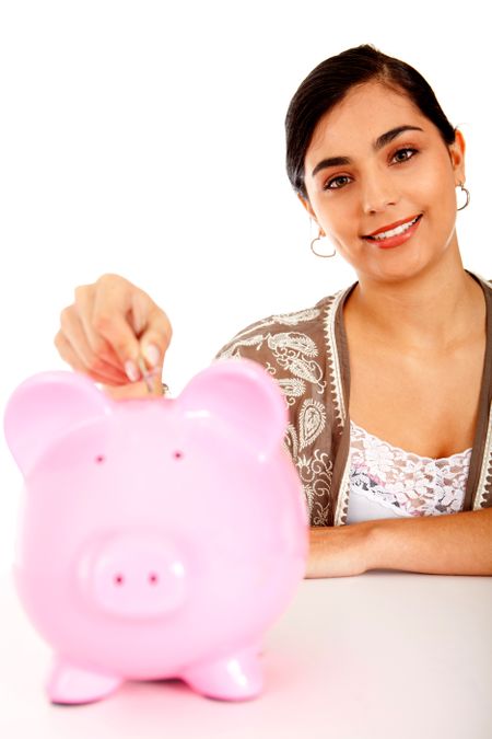 woman-putting-savings-piggy-bank-isolated-72940705 Woman putting her savings in a piggy bank ? isolated