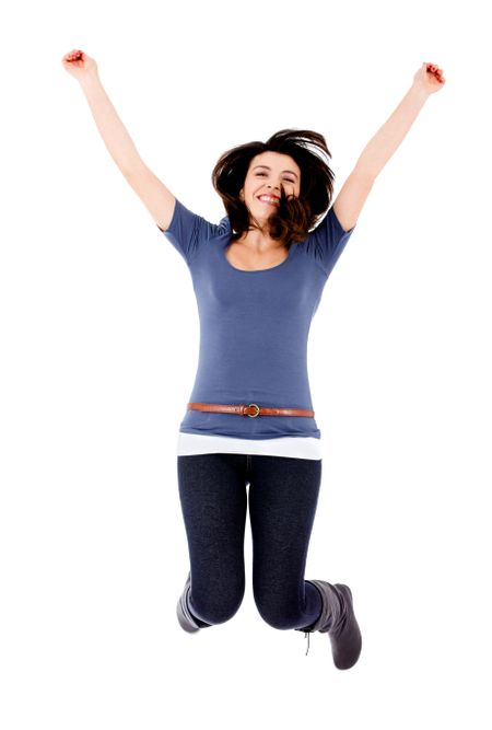 Happy woman jumping - isolated over a white background