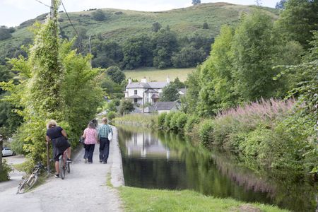 People Walking and Cycling, Shropshire Union Canal; Llangollen; Wales; UK
