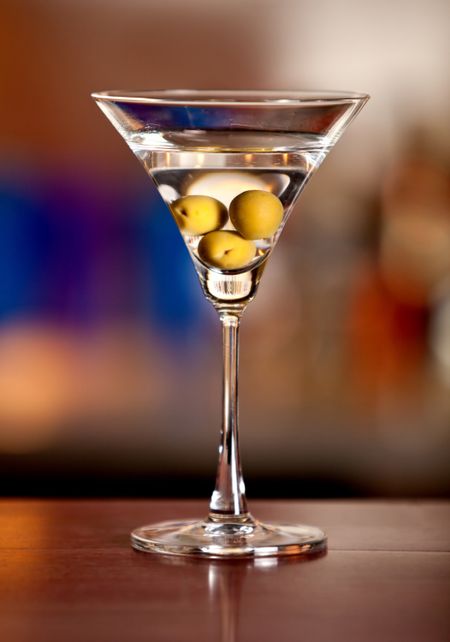 Glass of martini drink with olives ? cocktail concepts