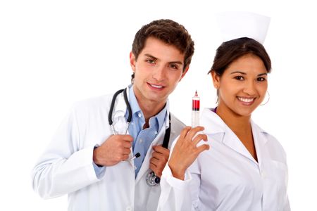 Male doctor and female nurse with a syringe  isolated over a white background