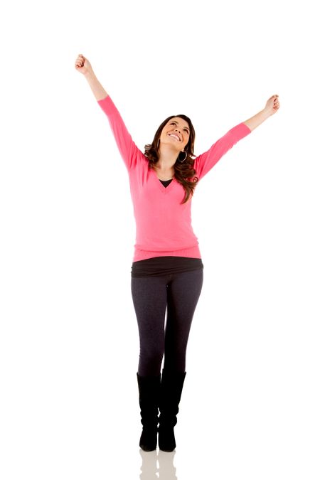 Happy woman with arms up - isolated over white