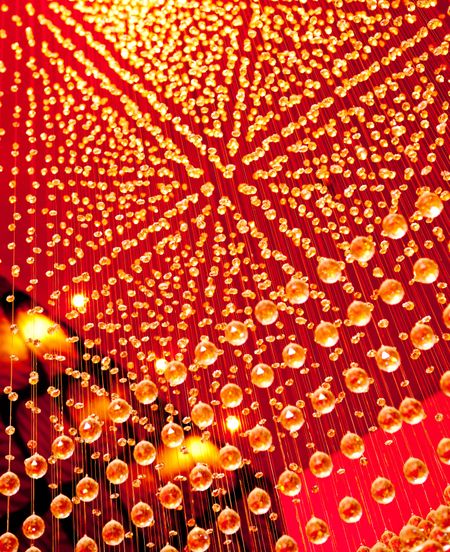 Beautiful shining chandelier hanging from the ceiling