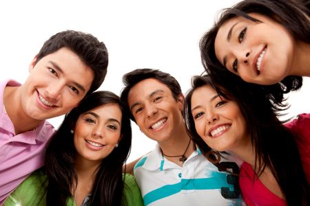 Happy group of friends hugging and smiling - isolated over white