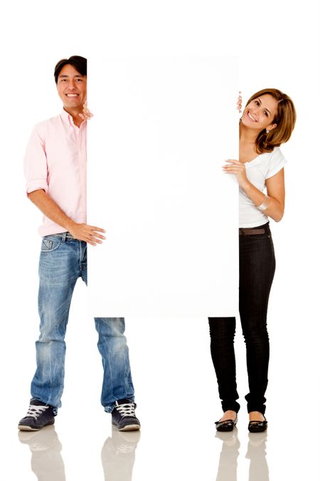 Casual couple with a banner - isolated over a white background