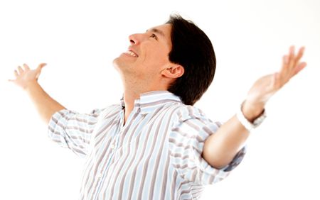 Successful man with arms open - isolated over a white background