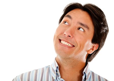 Pensive male portrait smiling - isolated over a white background