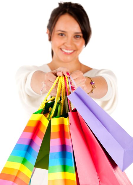 Shopping woman holding bags - isolated over white