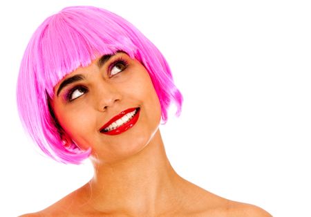 Beautiful pensive woman wearing a pink wig - isolated over a white background
