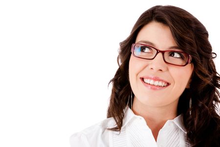 Thoughtful business woman smiling - isolated over white