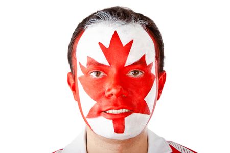 Canadian man with the flag painted on his face - isolated