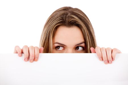 Pensive woman holding a banner ad - isolated over a white background