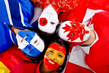 Group of people with flags of different countries painted on their faces