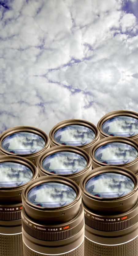 Camera Lenses with a blu sky reflection