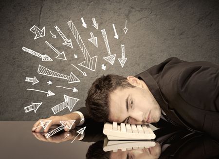 An exhausted business person resting his head on keyboard with pressure illustrated by arrows pointing at him concept