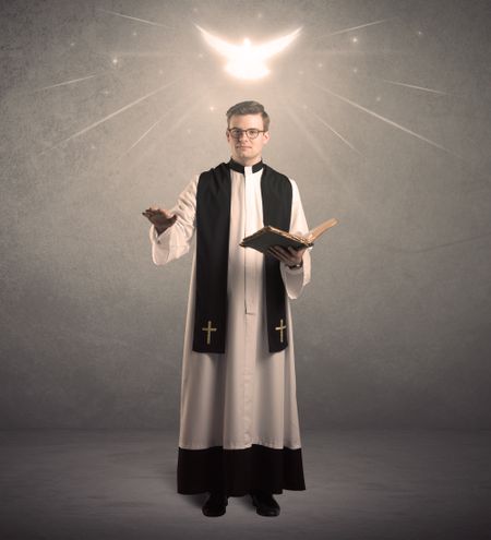 holy-priest-reading-prayer-holy-bible-771625033 A holy priest reading a prayer from the holy bible with illustrated glowing angel above his head concept.