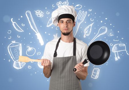 Young cook with kitchen instruments and drawn recipe concept on wallpaper
