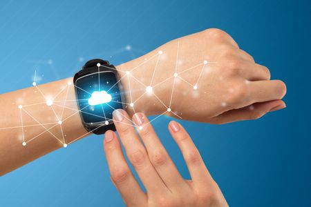 Naked female hand with smartwatch and with cloud technology and connection  symbol