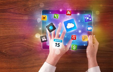 Caucasian business hands holding and working on tablet