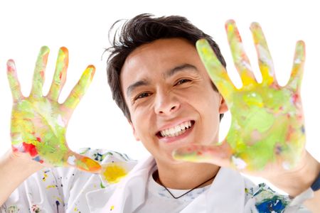 Male painter with hands dirty and smiling ? isolated over white