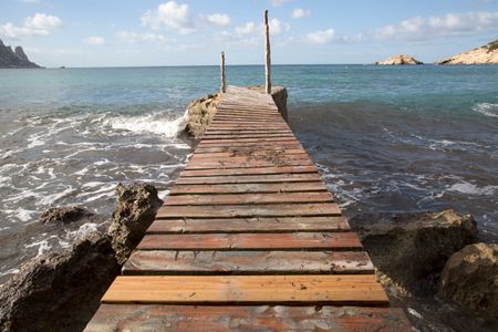 Pier at Cala Hort Cove, Ibiza; Spain