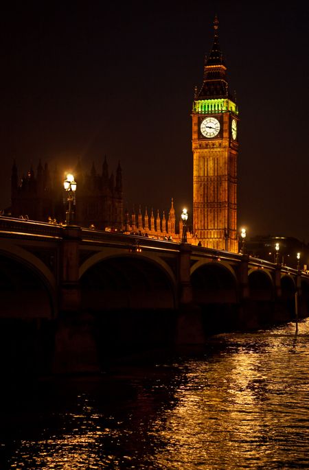 The Big Ben or Clock Tower of Westminster Palace seen from the distance at night