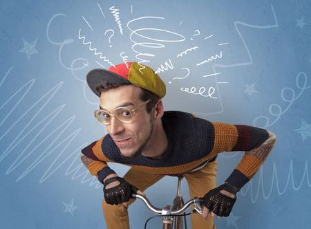 Young foolish crazy rider with doodle on the background