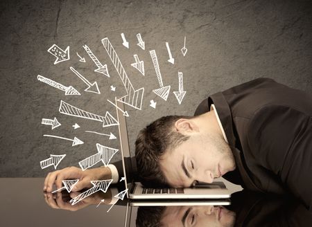 An exhausted business person resting his head on keyboard with pressure illustrated by arrows pointing at him concept