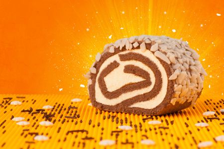 Sparkling tasteful home made sugar cake with coloful background