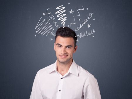 Young casual businessman with white scribbles around his head