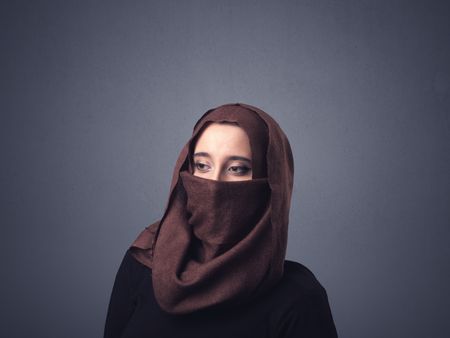 Young muslim woman wearing niqab 