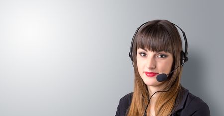 Young female telemarketer on a white background