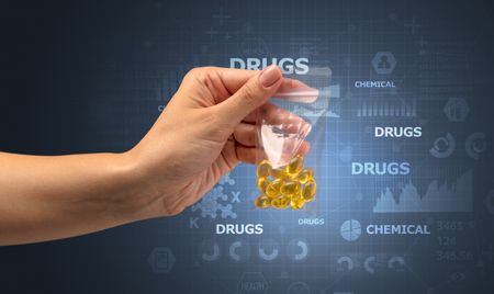 Naked hand gives chemicals in vacuum plastic bag with scholarly concept