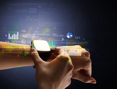 Cloe up naked female hand with smartwatch with financial symbols around