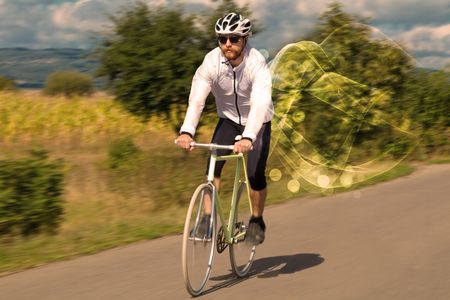 Gorgeous biker in the nature going somewhere with ethereal concept