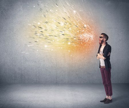 young-hipster-guy-beard-sunglasses-shouting-789229477 A young hipster guy with beard and sunglasses shouting in front of urban wall with vomit like colorful paint splatter on wall concept