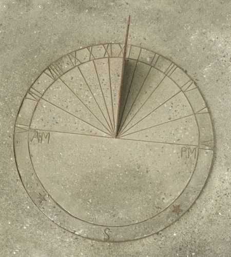 Outdoor sundial in concrete