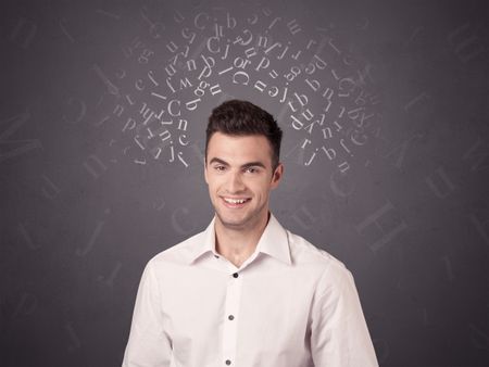 Young casual businessman with white alphabet around his head