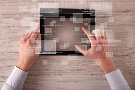 Caucasian business hands holding and working on tablet