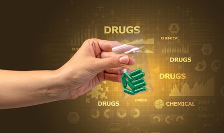 Naked hand gives chemicals in vacuum plastic bag with scholarly concept