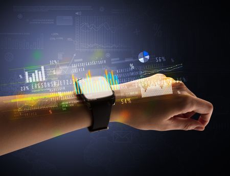 Cloe up naked female hand with smartwatch with financial symbols around