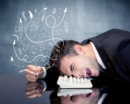 A depressed businessman resting his head on a keyboard and shouting with illustration of ideas, arrows, lines leaving his head concept